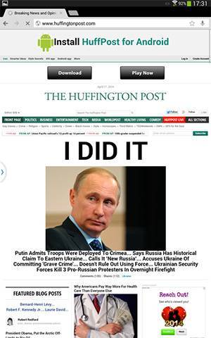 Сайт Huffington Post на экране планшета