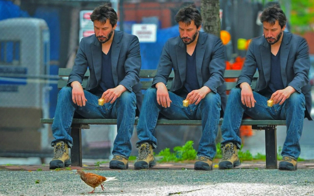 Keanu Reeves Sitting Alone